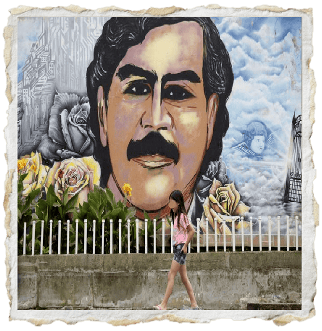 Graffiti of Pablo Escobar surrounded by flowers